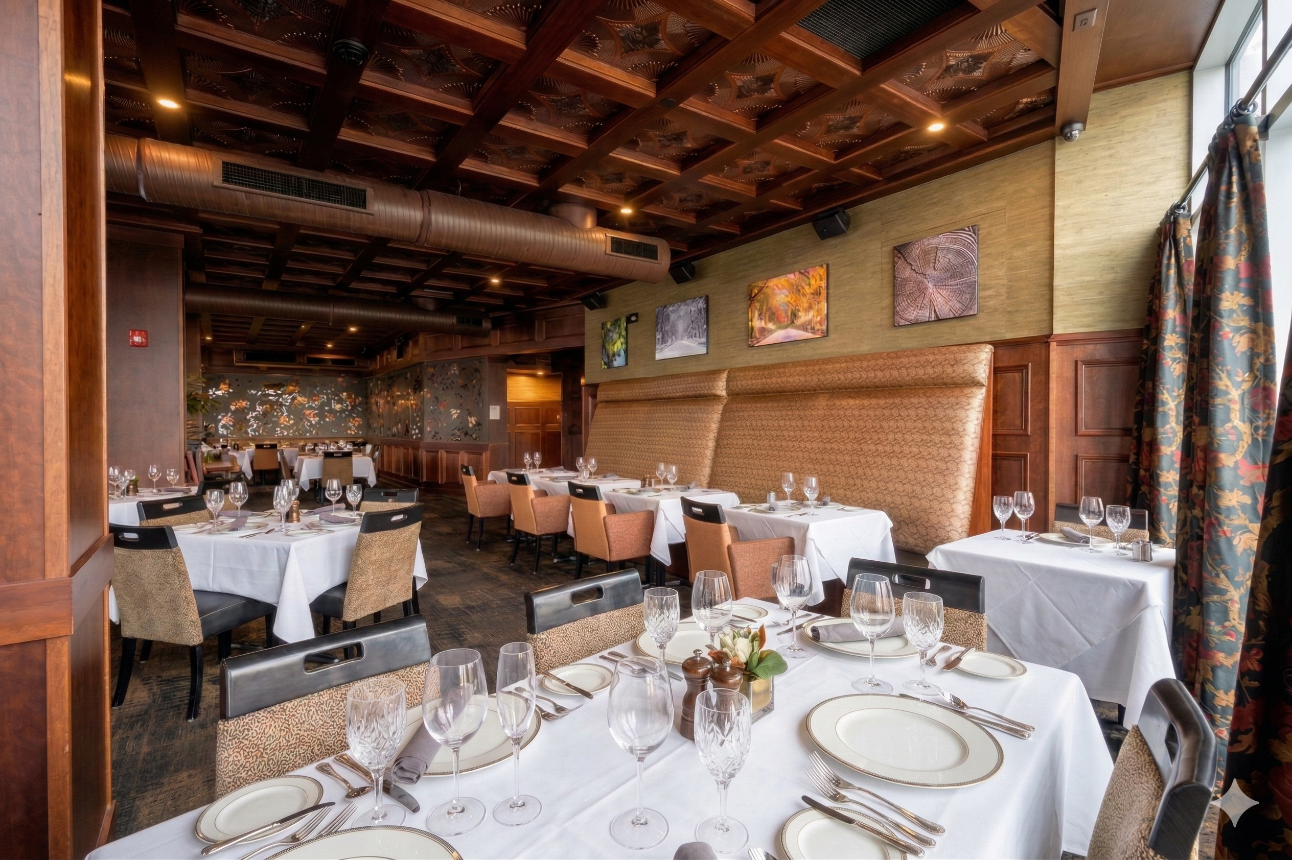 Reserve Steakhouse main dining room with elegant booth seating and warm wood interiors